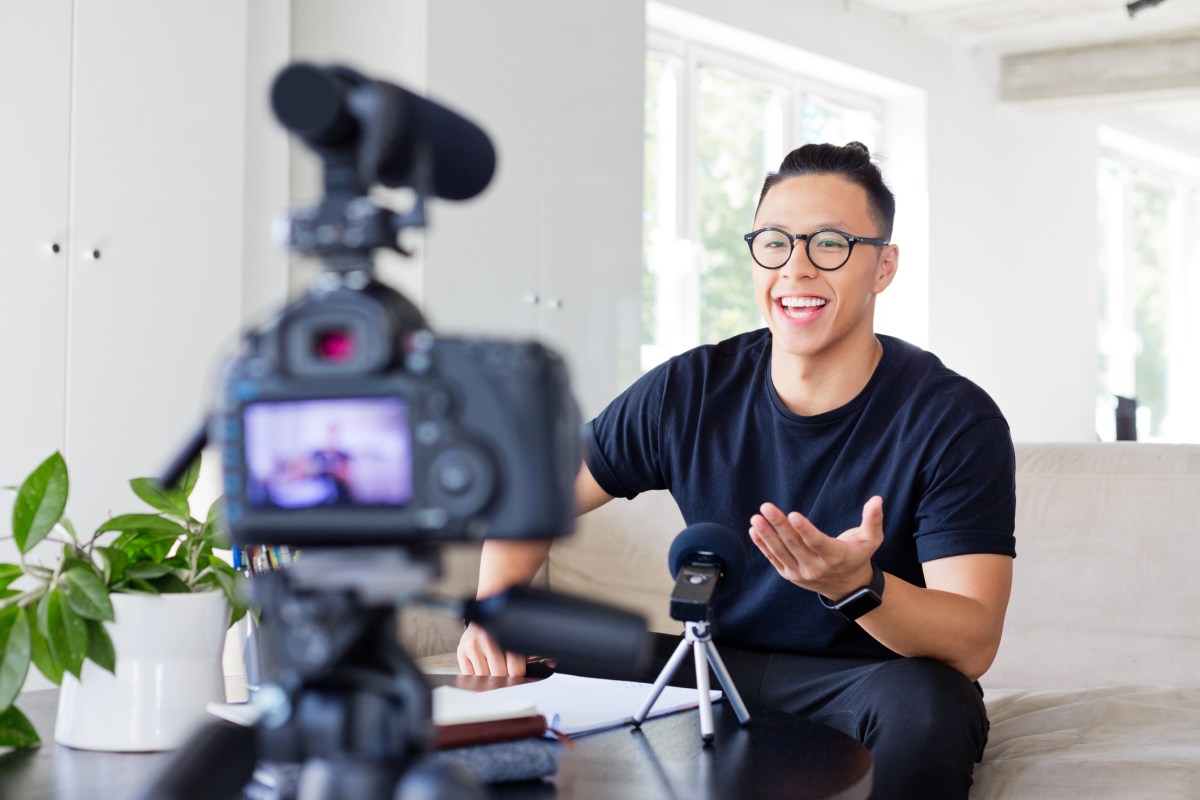 an influencer talking to a camera