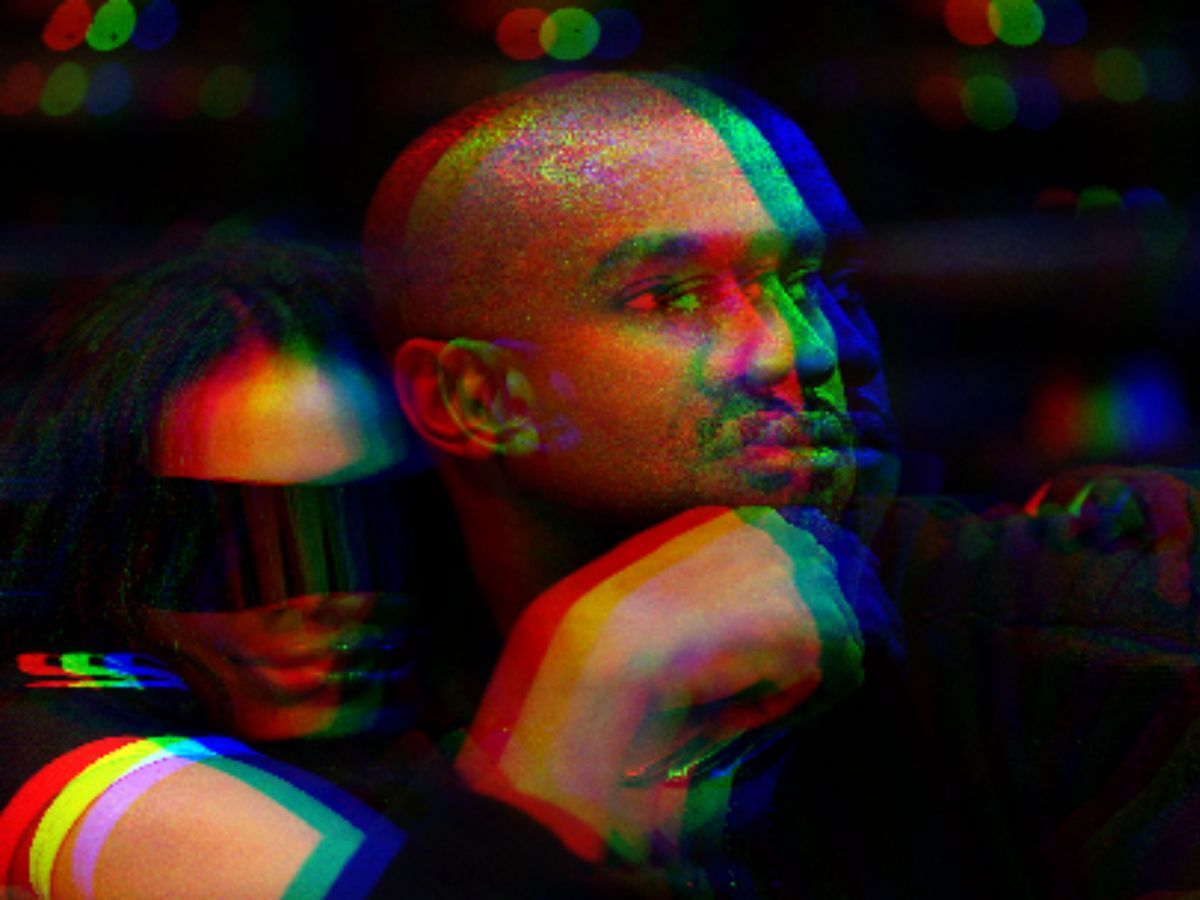 Kanye West sitting next to Kim Kardashian purchasing the Parler social media app