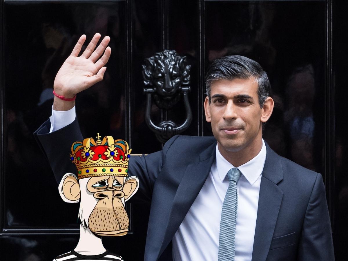 Rishi Sunak, the newest UK Prime Minister standing outside of 10 Downing Street with a Bored Ape Yacht Club NFT