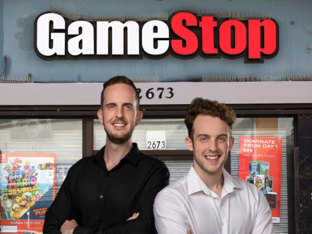 James and Robbie Ferguson from Immutable X standing in front of a GameStop storefront. dumb money