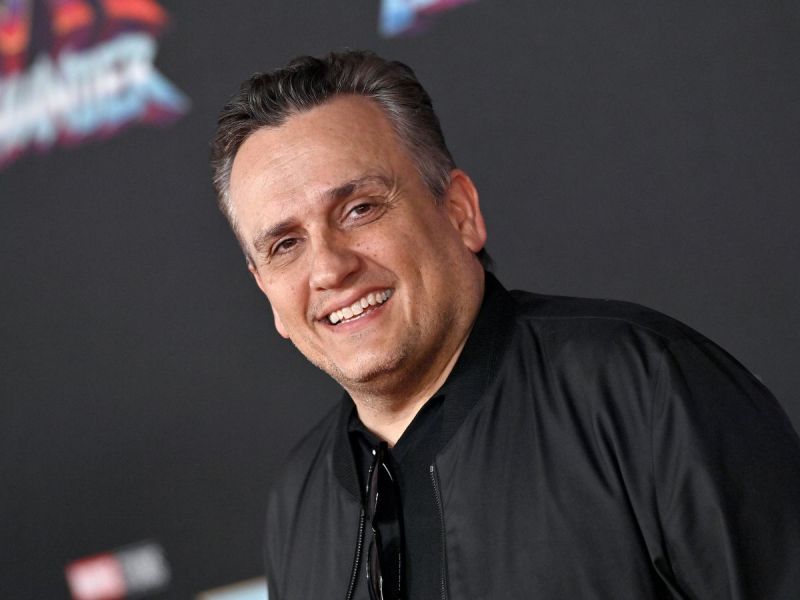 Joe Russo, director of several Marvel films, shared his views on AI technology. Image shows Joe Russo on the red carpet of a Marvel film.