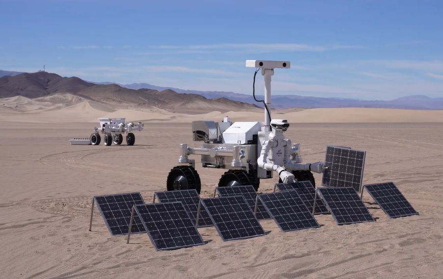 robots with solar panels, they look like Wall-E